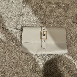 Elegant Cream Clutch with Gold Buckle